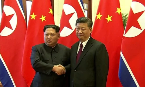 KIM JONG UN VIZITA BEIJING XI JINPING FOTO CCTV AFP