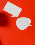 flat lay chat bubbles with two telephone receivers jpg