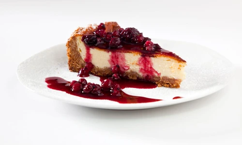 10463784   cheescake slice with soft fruits jpeg