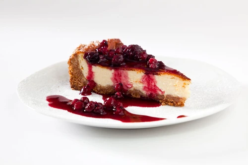 10463784   cheescake slice with soft fruits jpeg