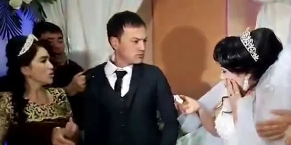 un mire o loveste pe mireasa foto captura video/daily mail