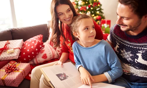 happy family reading book christmas jpg