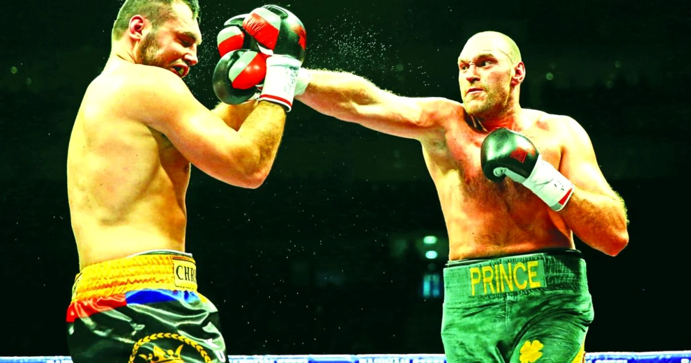 Ciocan (stânga) a primit o lovitură dură din partea lui Fury. FOTO: GettyImages