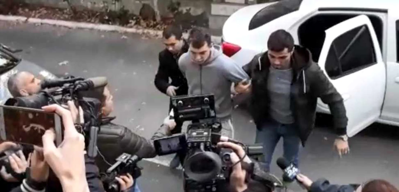 Imagine de la ducerea la arestare a lui Marius Parfenie FOTO Captură video