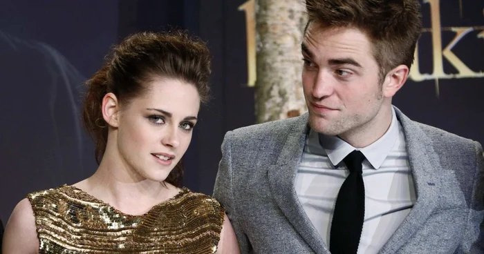Kristen Stewart şi Robert Pattinson, la premiera peliculei „Saga
Amurg: Zori de Zi – partea a 2-a“ de la Berlin. FOTO Reuters
