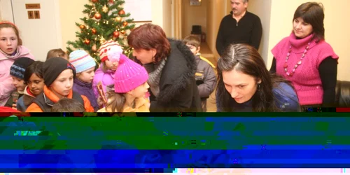 Asistenţa socială colindată de copii