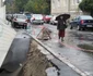 Trotuarul a început să se surpe în Râmnicu Vâlcea. O stradă din centrul oraşului ar putea fi afectată şi ea de alunecările de teren