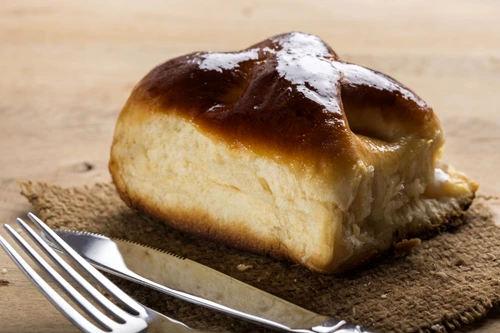 53447206 fresh romanian cheese pie with fork and knife jpeg