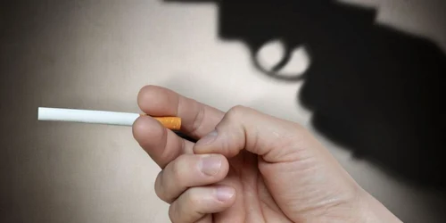 tigara fum de tigara pistol shutterstock