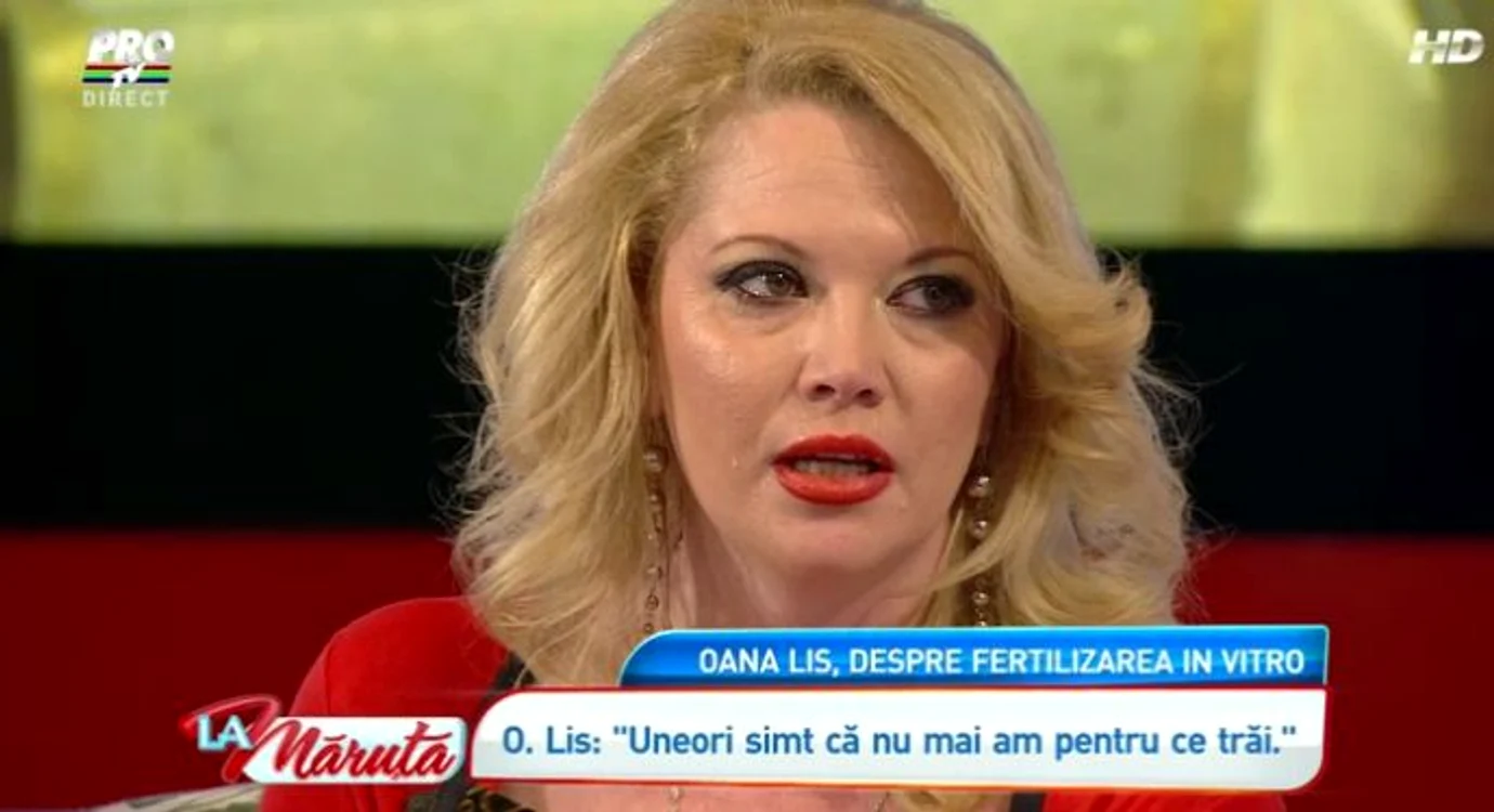 Oana Lis, cu un bebeluş în braţe