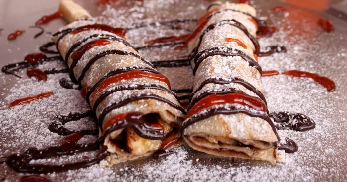 Clătitele se pot umple cu ciocolată, dulceaţa sau chiar amestec pentru tiramisu FOTO Shutterstock