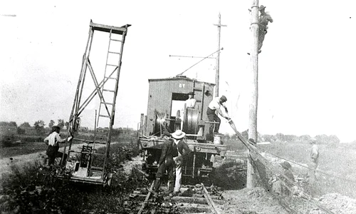 Construction workers raising power lines   DPLA   fd565d9aa7d12ccb81f4f2000982d48a jpg