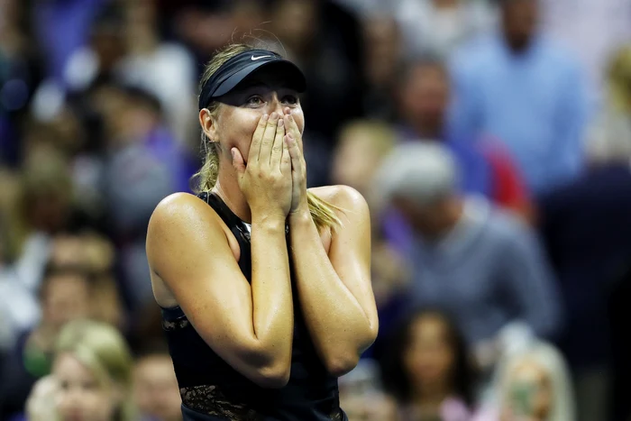Maria Sharapova a izbucnit în lacrimi după ce a câștigat meciul cu Simona HalepGetty Images