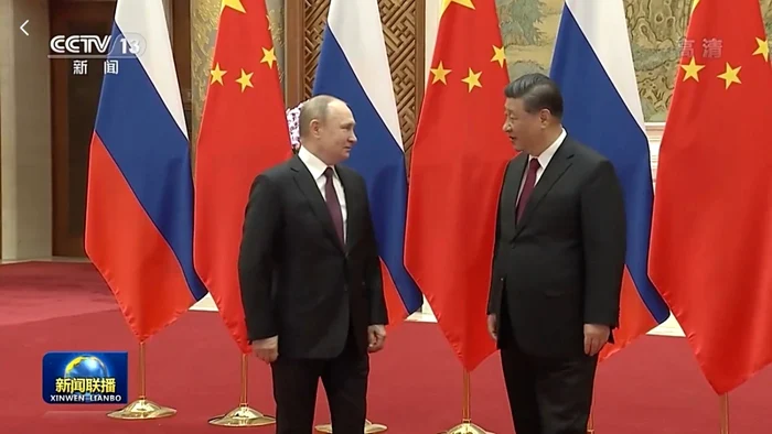 Foto: Preşedinţii Vladimir Putin (stânga) şi Xi Jinping (dreapta)