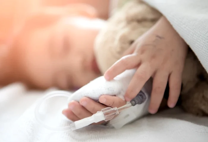 Copil pe patul de spital SURSĂ Arhiva Adevărul