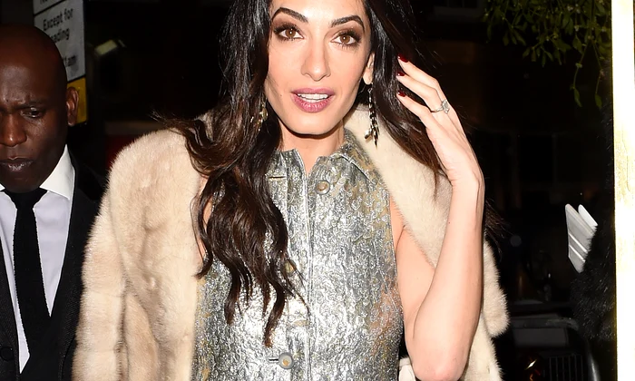 Amal Clooney Leaving Charlotte Tilburys Xmas Party jpeg