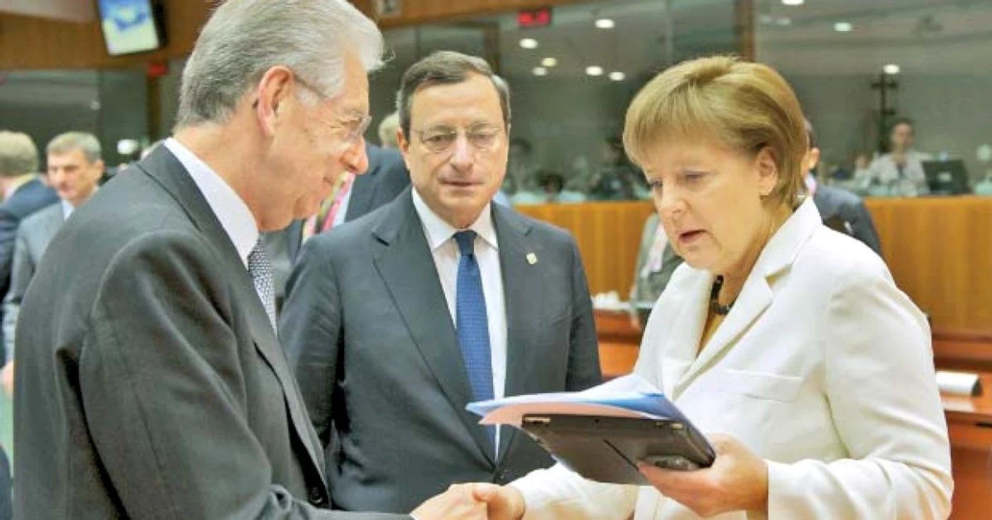 Cancelarul german, Angela Merkel,  le-a făcut concesii premierului  Mario Monti şi preşedintelui BCE, Mario Draghi, ambii italieni