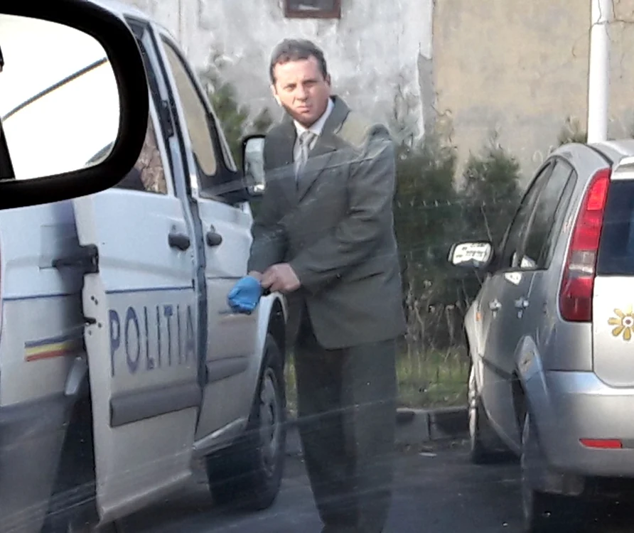politist impuscat olt