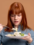 woman with eating disorder trying eat healthy jpg