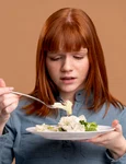 woman with eating disorder trying eat healthy jpg