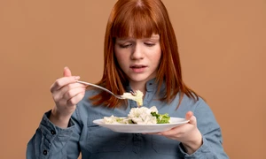woman with eating disorder trying eat healthy jpg