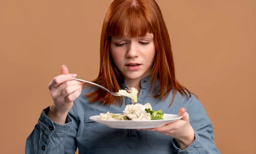 woman with eating disorder trying eat healthy jpg