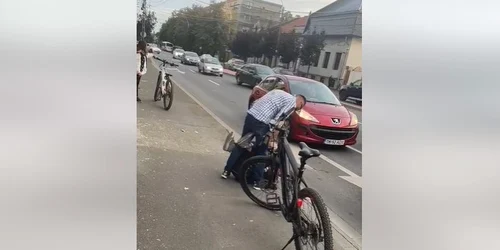 bataie biciclist sofer jpg