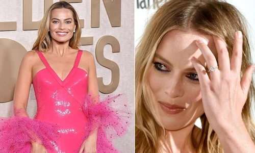 Margot Robbie, vedeta din filmul Barbie  side jpg