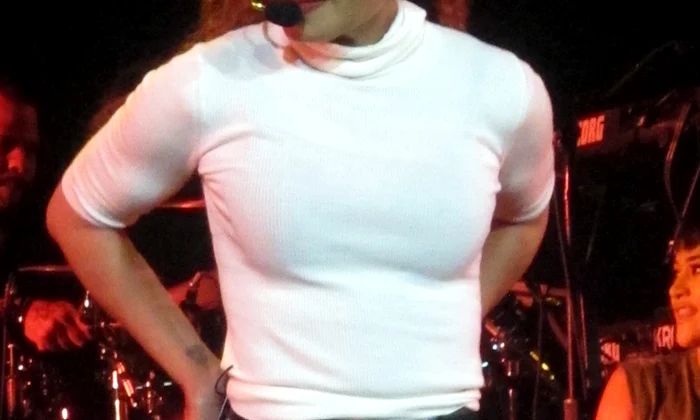 Janet Jackson looking great in tight jeans performs the opening night of her State Of The World tour at the Cajundome in Lafayette, LA after postponing touing over a year ago  to start a family jpeg