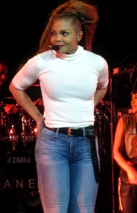 Janet Jackson looking great in tight jeans performs the opening night of her State Of The World tour at the Cajundome in Lafayette, LA after postponing touing over a year ago  to start a family jpeg
