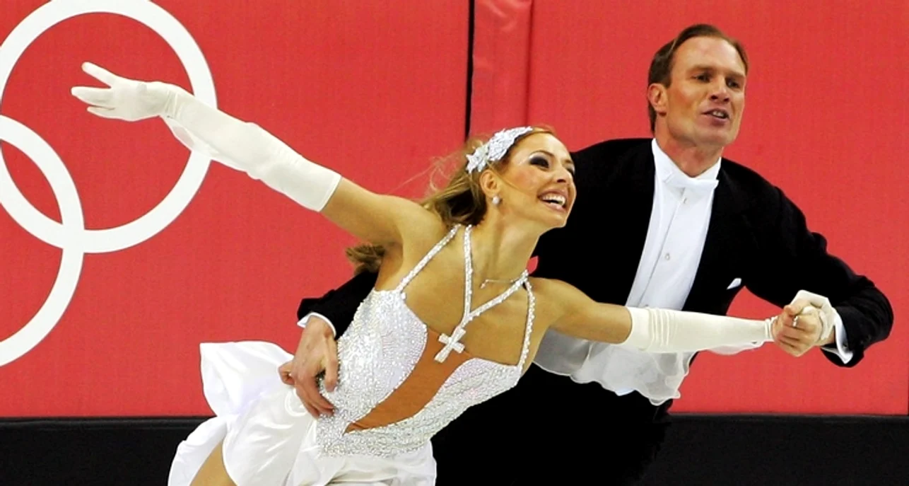 Roman Kostomarov și partenera sa, la JO de la Torino. Foto Getty images 