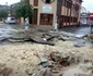 Strada din Cernavodă cu asfaltul distrus de inundaţii