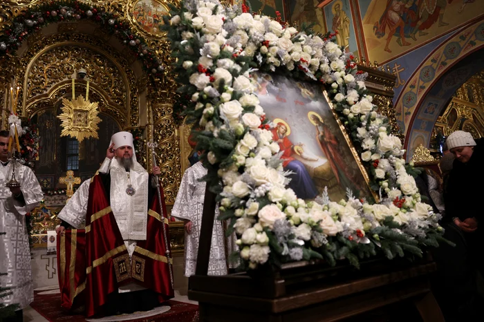 Slujbă religioasă în Ajunul Crăciunului la Mănăstirea Sfântul Mihail din Kiev Foto AFP