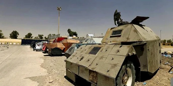 Vehicule capturate in Mosul de la Statul Islamic FOTO Thaier al-Sudani