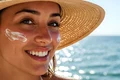 woman with sunscreen her face jpg
