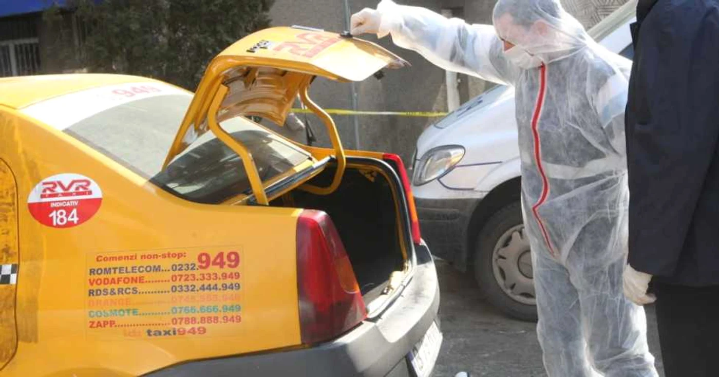 Criminaliştii iau probe de pe taxiul furat