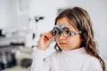 little girl checking up her sight ophthalmology center jpg
