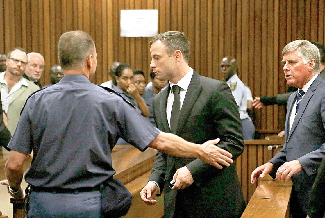 
    Pistorius şi Reeva Steenkamp, cu câteva luni înainte de a o ucide Foto: Guliver  