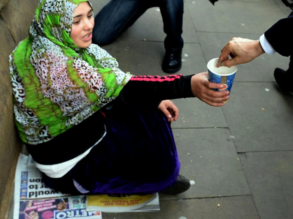 Cerşetorea româncă a primit de la milionar 2 pence foto: Gulliver/Getty Images