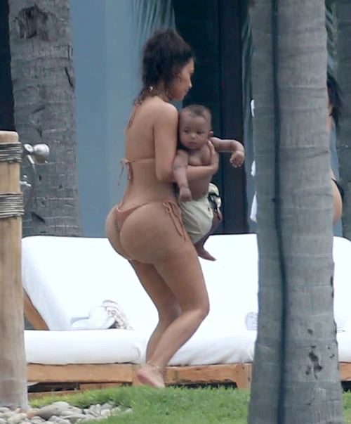Kim Kardashian & Kids Enjoy A Day Poolside In Mexico jpeg
