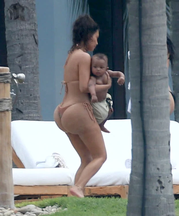 Kim Kardashian & Kids Enjoy A Day Poolside In Mexico jpeg