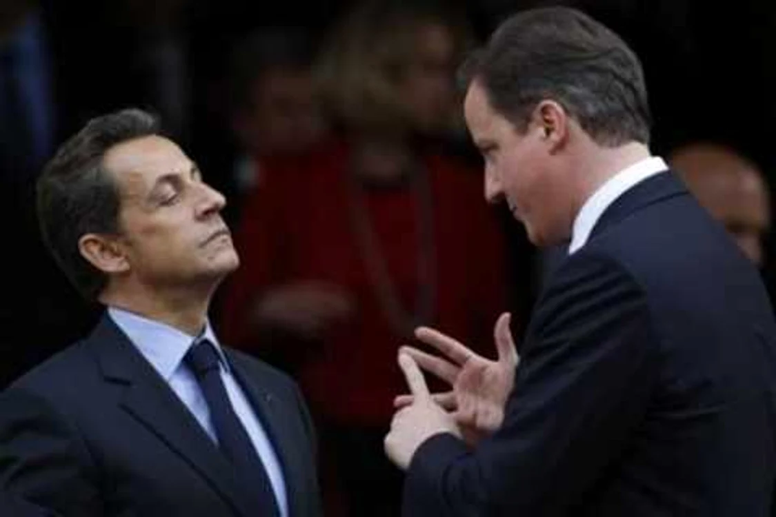 Preşedintele Nicolas Sarkozy şi premierul David Cameron