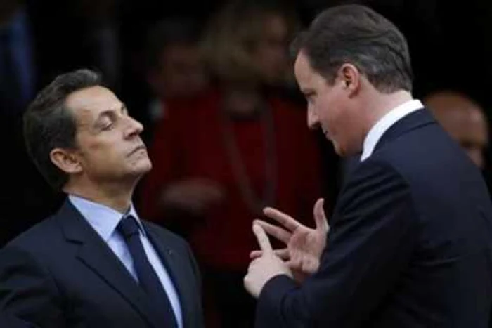 Preşedintele Nicolas Sarkozy şi premierul David Cameron