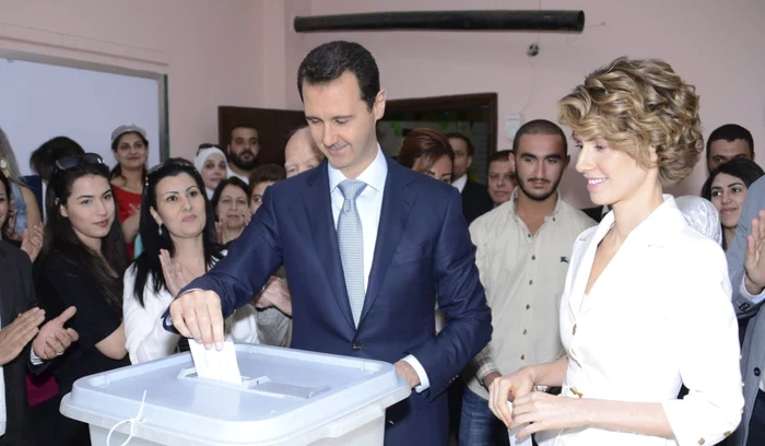 Preşedintele Siriei, Bashar al-Assad, alături de soţia lui, Asma, la vot FOTO Reuters