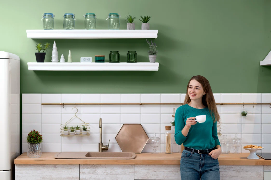 woman having cup coffee green kitchen jpg