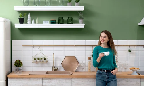 woman having cup coffee green kitchen jpg