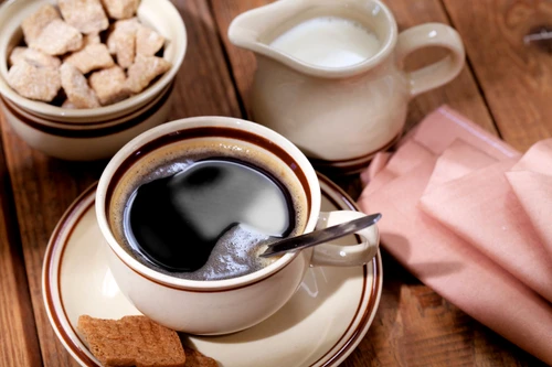 10615653 coffee milk and sugar on wooden table jpeg
