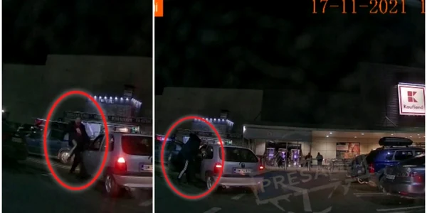 Bătaie în faţa unui hipermarket pentru un loc de parcare foto