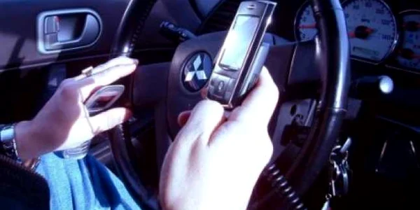 Obama interzice SMS-urile la volan