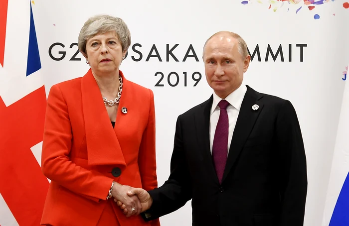 Theresa May și Vladimir Putin s-au întâlnit la summit-ul G20 de la OsakaFoto: EPA-EFE